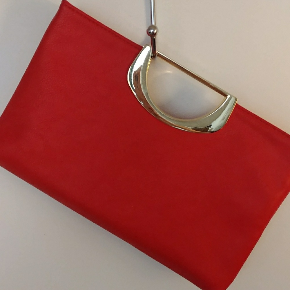 Coral leather convertible clutch